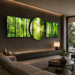 Sunbeams streaming through a fresh green forest canopy of tall slender trees. 3 piece glass wall art set B