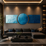 Abstract flowing water in shades of blue, from pale aqua foam to deep navy depths. 3 piece glass wall art set B