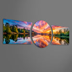 A blazing orange and pink sunset sky mirrored on a calm forest lake, framed by lush green trees. 3 piece glass wall art set E