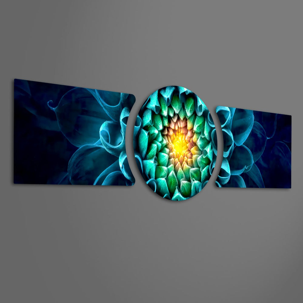 A macro close-up of a dahlia flower with teal-blue petals spiraling toward a radiant green and gold glowing center. 3 piece glass wall art set F