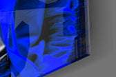 Einstein blue glass wall art catching light to reveal its inked detail