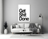 Get Shit Done glass wall art catching light to reveal its high-contrast typography