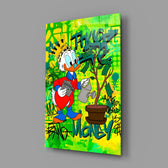 Close-up detail of Scrooge watering the money tree behind glass