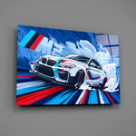 Designer-collection M-Sport panel anchoring a garage lounge wall