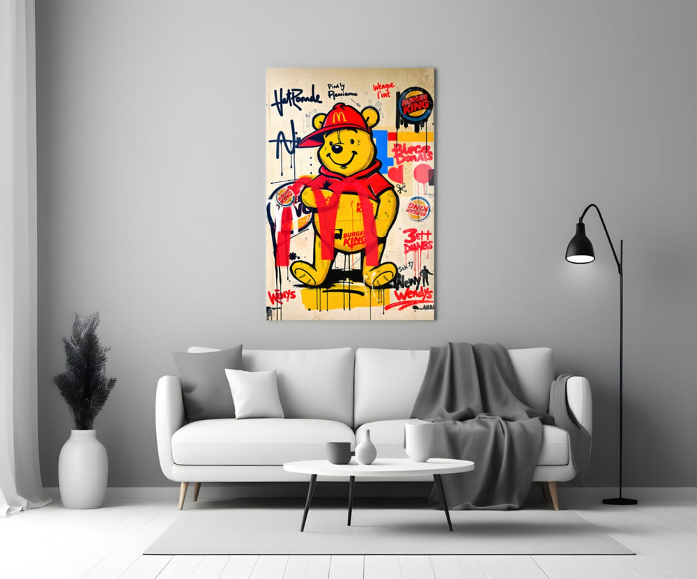 Close-up detail of Pooh in Burger King cap with brand graffiti behind glass