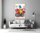 Close-up detail of Homer and Marge on dirt bike with brand graffiti behind glass