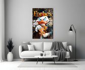 Close-up detail of Scrooge with gold dollar sign and Forbes typography behind glass