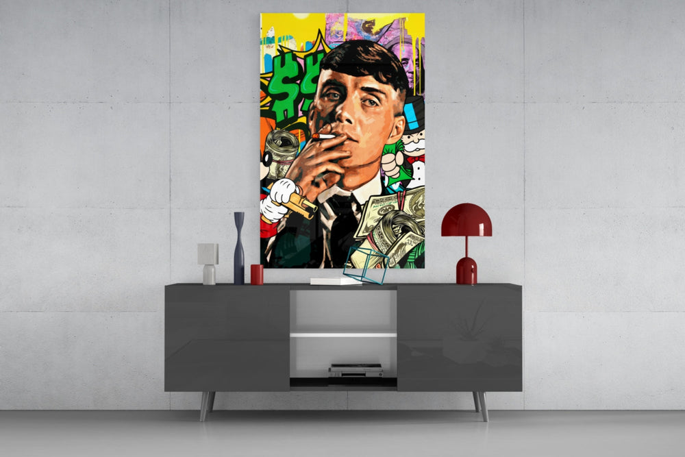 Money and Power glass wall art catching light to reveal its layered tags