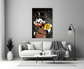 Close-up detail of Scrooge with Bitcoin coin and LV monogram behind glass