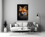 Close-up detail of the red fox and amber eyes behind glass