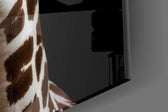 Designer-collection artwork in a luxe lounge with leather seating