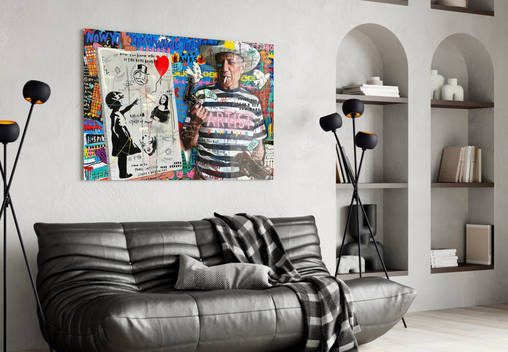 Picasso-Banksy artwork styled in a pop-art-loving loft