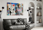 Picasso-Banksy artwork styled in a pop-art-loving loft