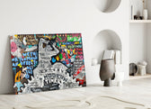 Close-up detail of classical nude in graffiti collage behind glass