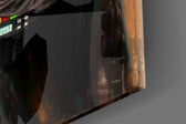 Designer-collection artwork in a Marvel-and-sci-fi-leaning home interior