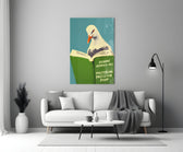 Close-up detail of seagull reading green textbook behind glass