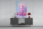 Grape Goddess glass wall art catching light to reveal its painted texture