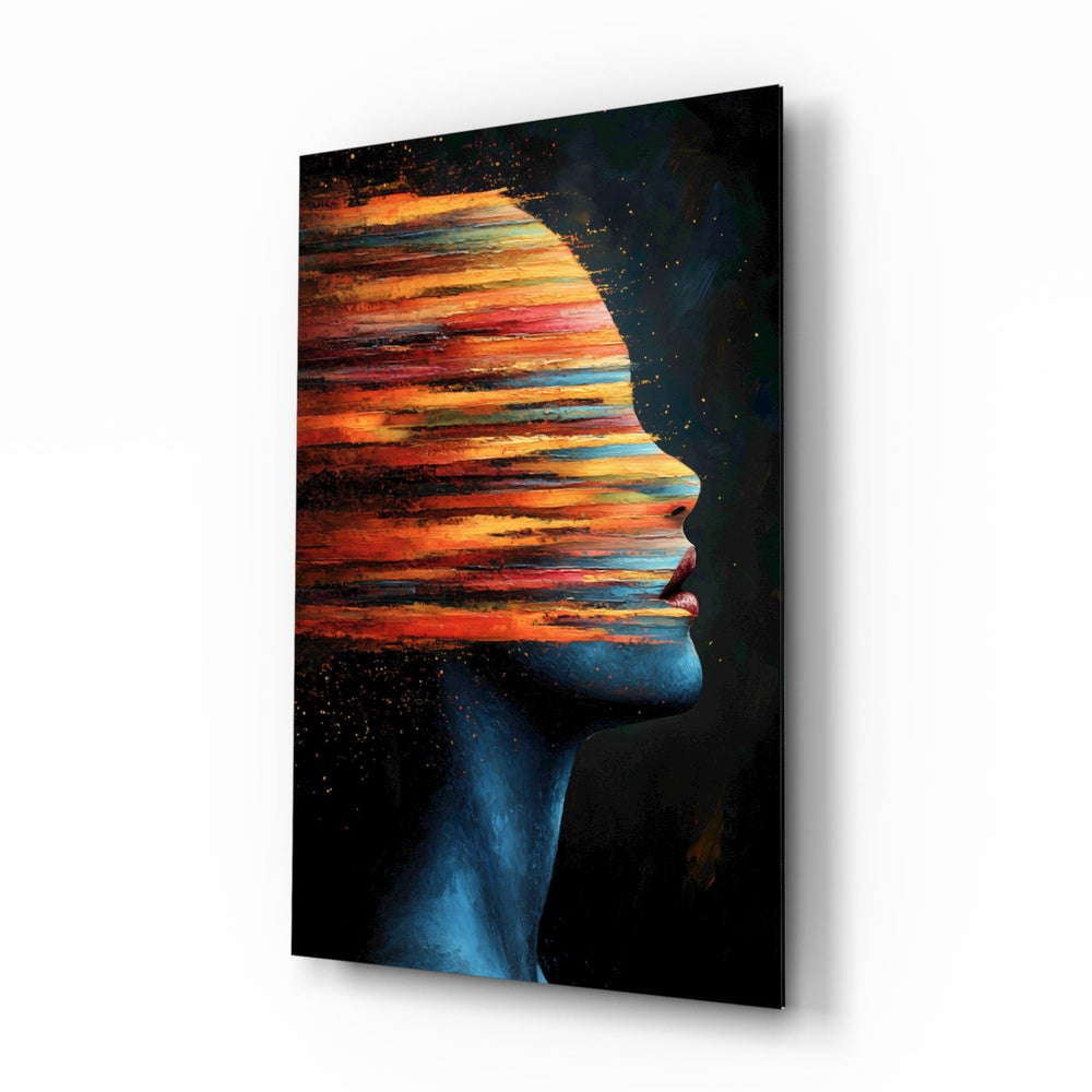 The Face of Colors glass wall art in a modern creative loft