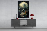 City Skull glass wall art catching light to reveal its painted drip