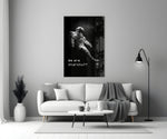 Close-up detail of astronaut in starfield with quote behind glass