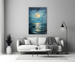 Close-up detail of lone boat under full moon behind glass