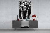 Loneliness in a Crowd glass wall art catching light to reveal its painted blur