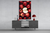 Queen of Apples glass wall art catching light to reveal its painted dew