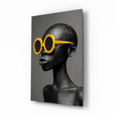 Faces of Colors marigold glass wall art in a modern boutique