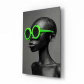 Faces of Colors lime glass wall art in a modern boutique