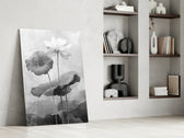 Botanical panel against a moody dark-painted accent wall