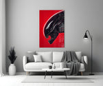 Close-up detail of Xenomorph head on scarlet field behind glass