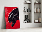 Xenomorph panel against a moody dark-painted accent wall