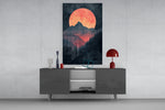 Red Moon Rising glass wall art catching light to reveal its painted layers