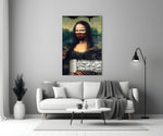 Close-up detail of Mona Lisa with mask and dollar-rolls behind glass