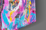Designer-collection artwork in a millennial-pink-leaning home interior