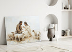 Close-up detail of Holy Family with lambs in cream palette behind glass