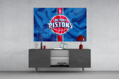Detroit Pistons banner glass wall art catching light to reveal its painted ripples