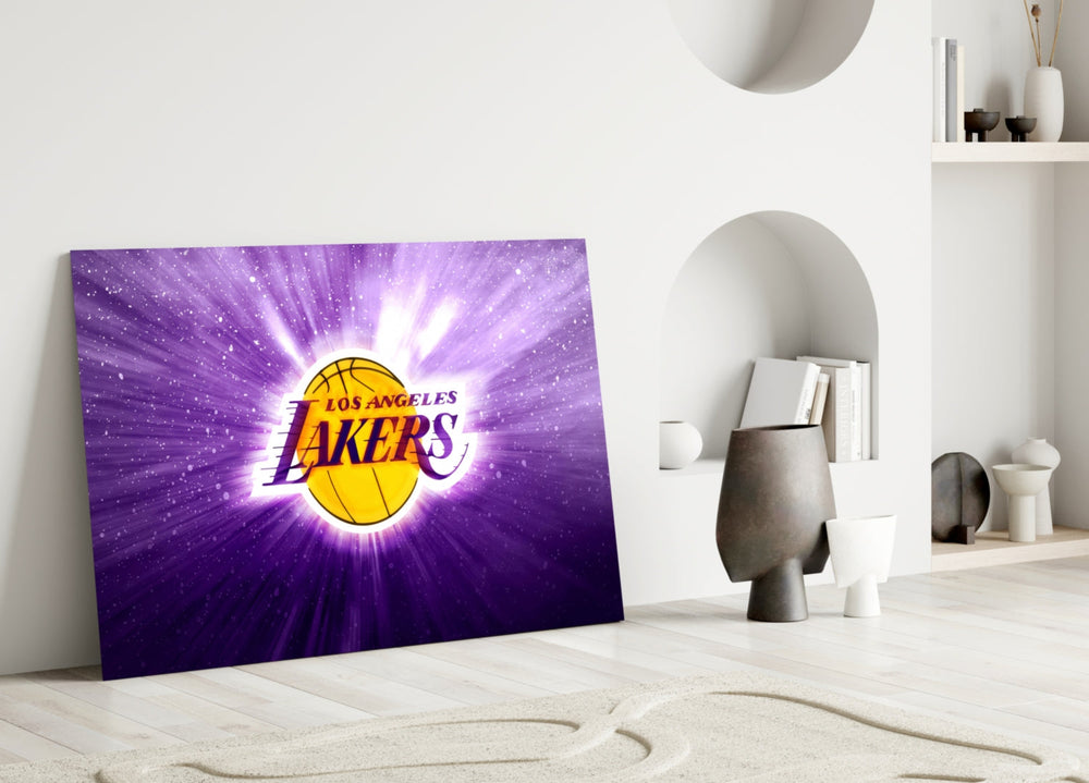 Close-up detail of Lakers logo with purple cosmic burst behind glass