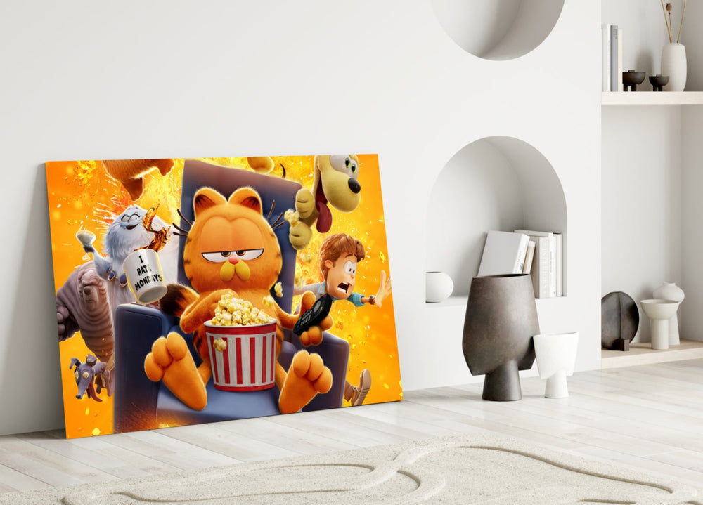 Close-up detail of Garfield with popcorn and crew behind glass