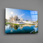 Thai sacred architecture pearl-white spires glass wall art over modern living-room sofa