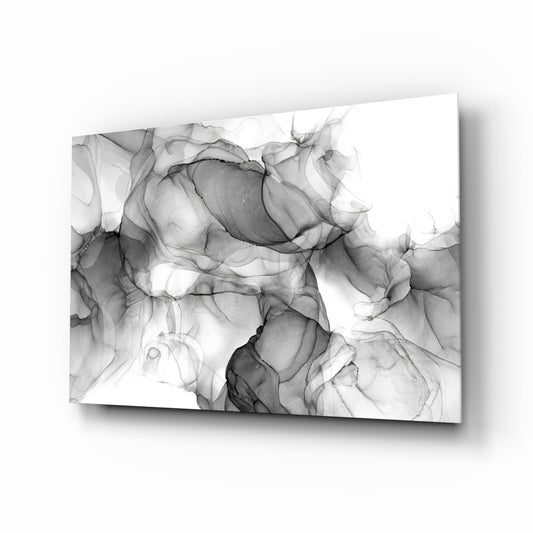 Black ink swirl minimalist glass wall art above ivory linen sofa in serene living room