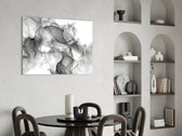 Monochrome fluid-art ink glass wall art above modern dining sideboard