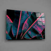 Teal-and-pink tropical foliage glass wall art over modern living-room sofa