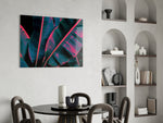 Magenta banana-leaf macro glass wall art over master-bedroom headboard
