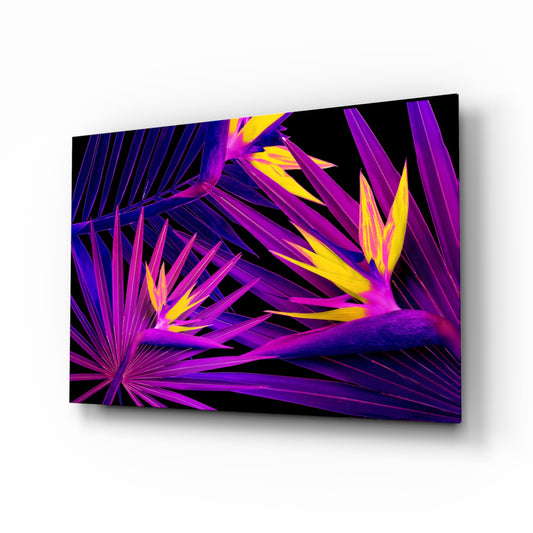Neon bird-of-paradise strelitzia glass wall art above black-marble dining table