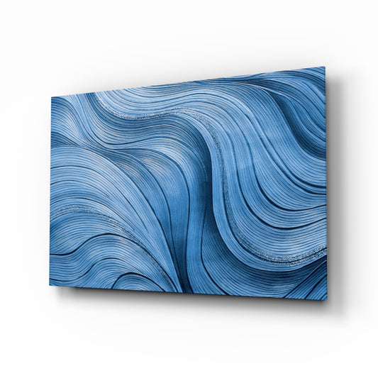 Sapphire painterly waves glass wall art above linen sofa in serene living room