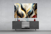 Antique-gold and charcoal flame glass wall art in luxury hotel lobby