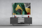Antique-gold and emerald ribbon glass wall art in luxury hotel lobby