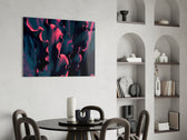 Charcoal-and-pink leaf cinematic glass wall art over master-bedroom headboard