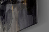 Charcoal-and-ivory feather glass wall art in boutique-hotel lounge